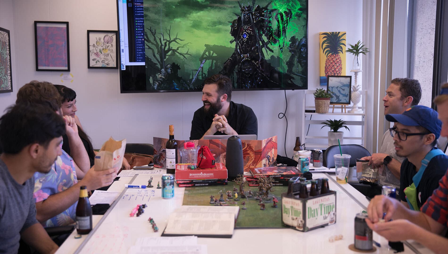 A group playing Dungeons & Dragons around a table